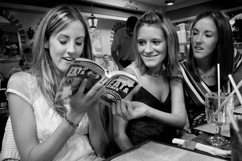 At a bachlorette party, Shalyn pulled out a calorie guide before ordering food with best friends Gwen Boeglin, left, and Emily Schum. During her darkest periods, Shalyn limited contact with her twin friends. "We really felt helpless," Gwen said. "She wouldn't even talk to us to tell us how she's doing."