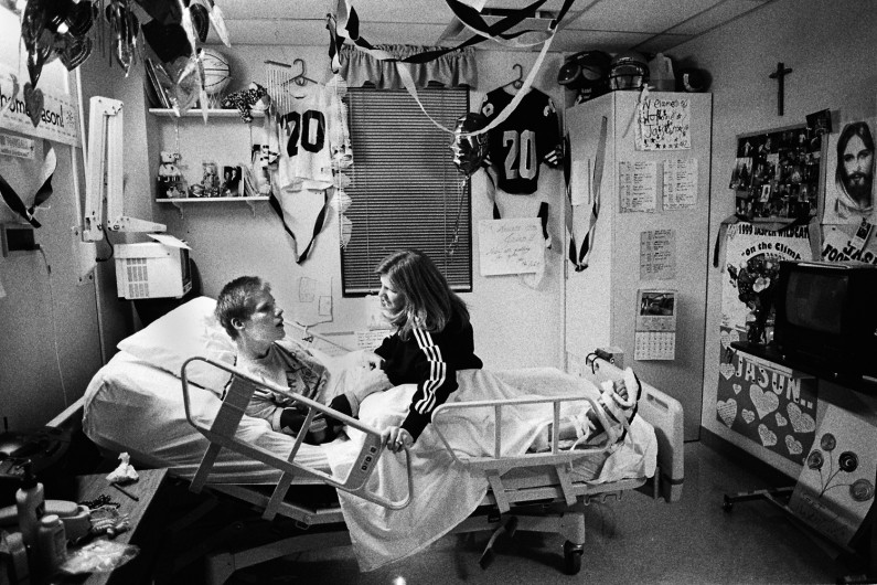 Jason began to wake from his coma shortly after his return home. Here, his mother, Brenda Krempp, encourages him to hold his head up on his own.