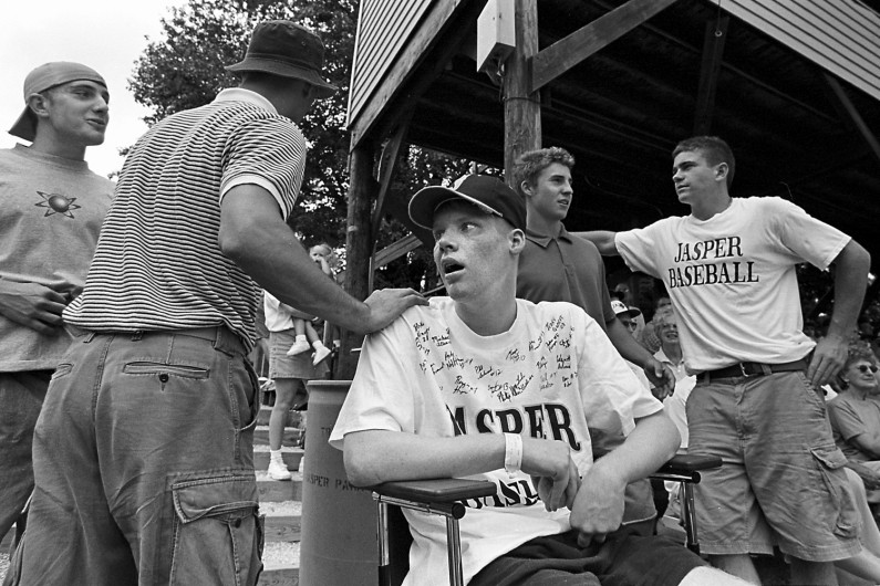 Jason created a buzz with a swarm of friends at a Jasper baseball game. Jared Himsel, left, Job Zoglman, Justi Schwenk and Eric Wigand were at his side.