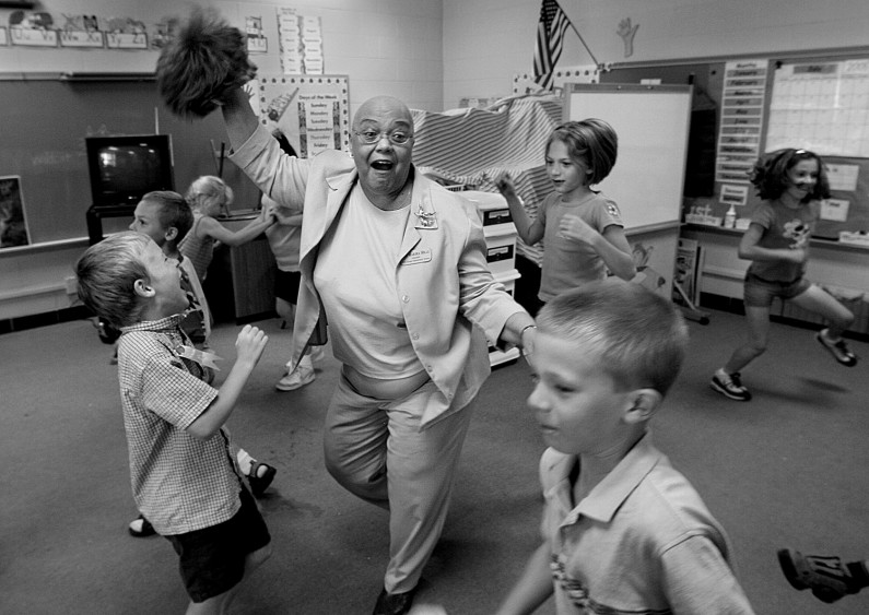 On the final day of class, Marsha pulled off and twirled her wig during a dance with her students, including Ben Nolan, left, Collin Schue, Emily Wininger and Alyssa Simmers.