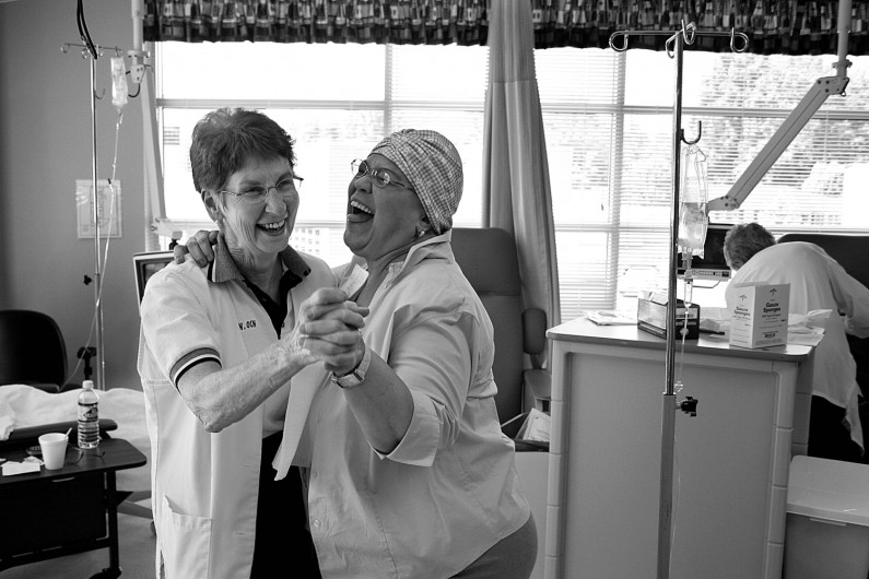 Marsha was upbeat throughout treatment at Memorial Hospital's Oncology Clinic and had the nurses, including Alice Kluesner, dancing on the day of her final treatment.