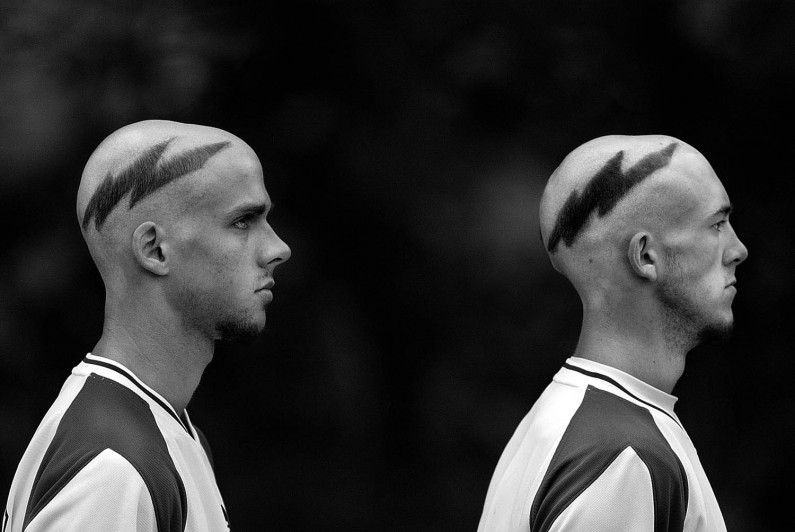 Several Forest Park players sported mohawks and other hairstyles to prepare for a first-round sectional tournament game with Castle at Heritage Hills. Nathan Allen, left, and Trae Childress chose to carve out lightning bolts to celebrate their speed.